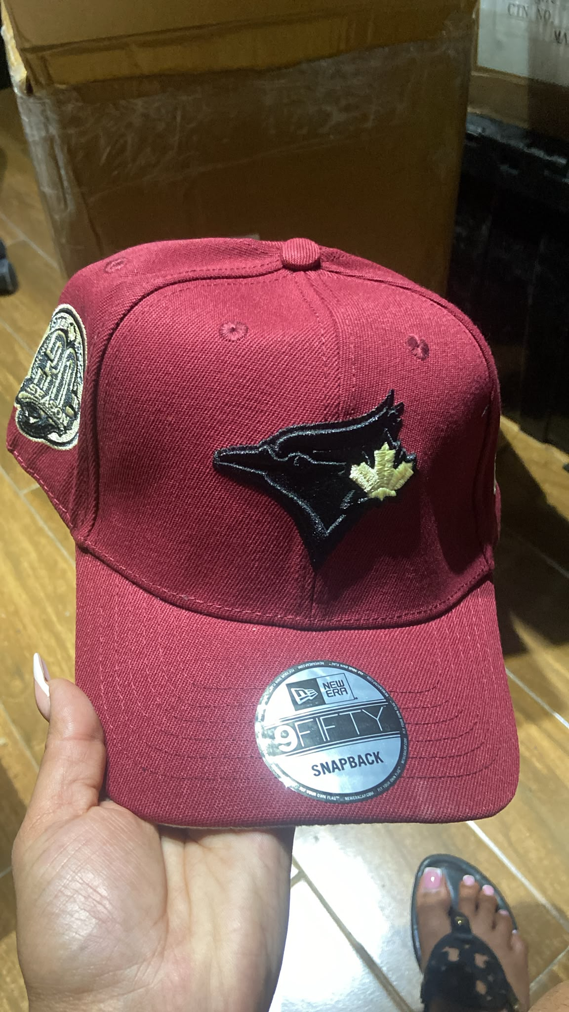 Burgundy New Era 9FIFTY Toronto Blue Jays snapback hat with embroidered front logo
