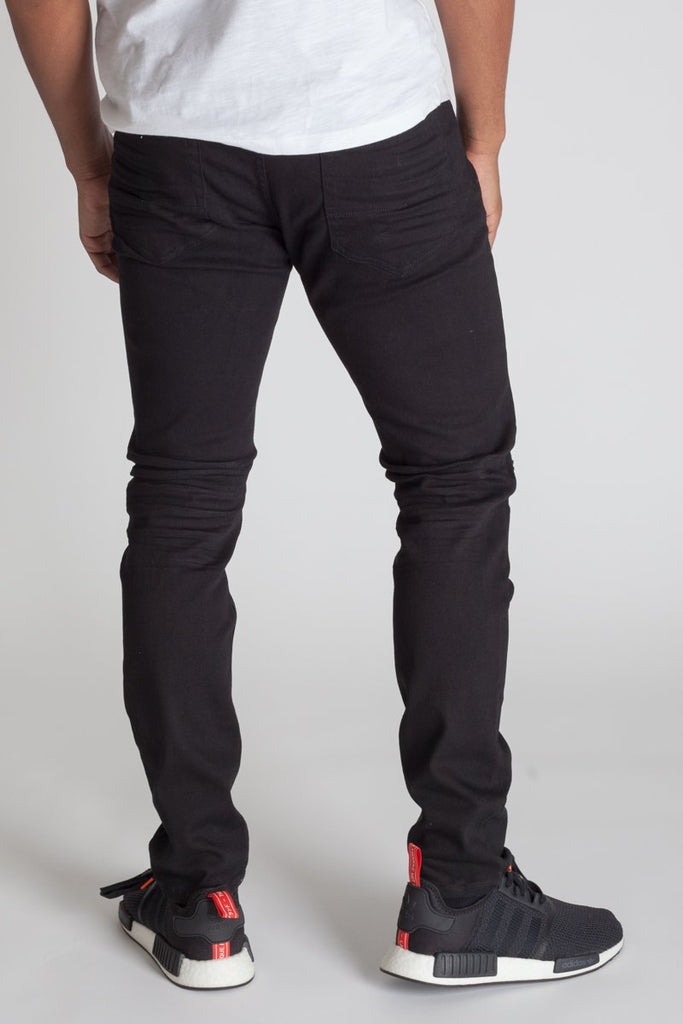 KDNK Patched and Distressed Skinny Jeans